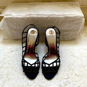 Rhinestone and black Calvin Klein strappy sandals.  Size 7